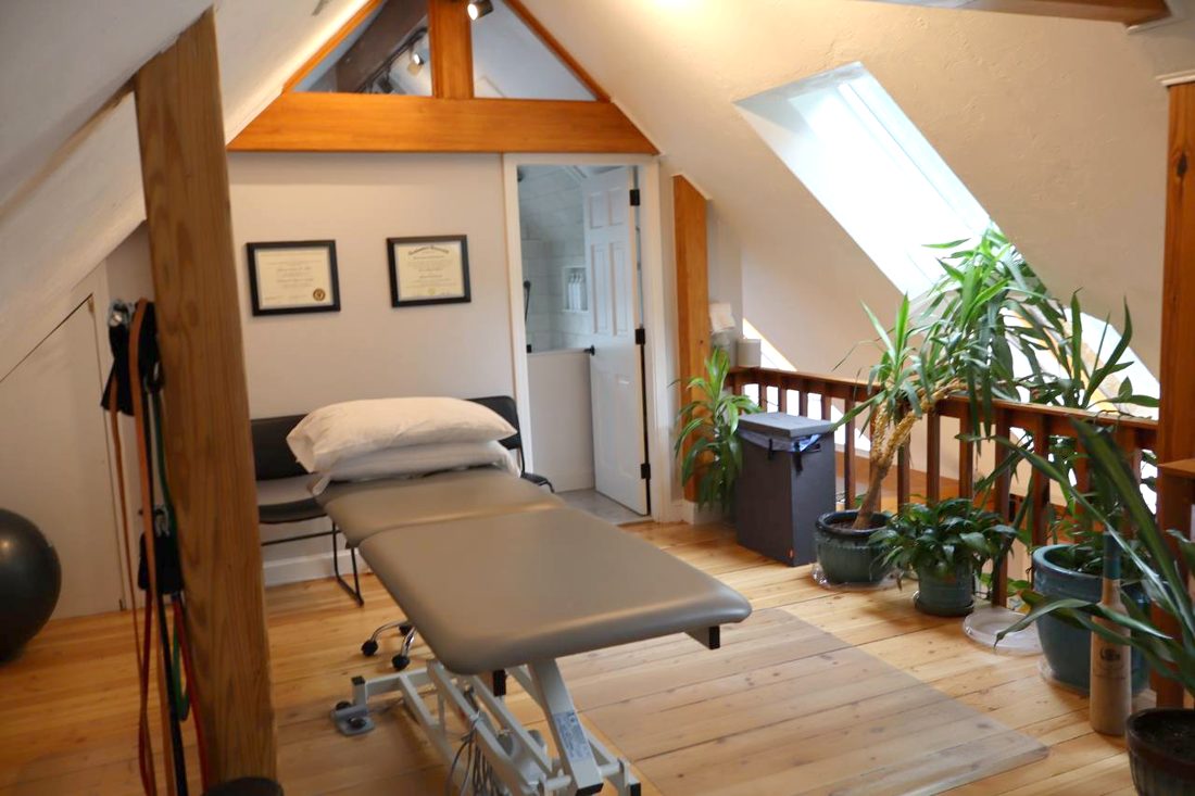 Private treatment room under the original beams
